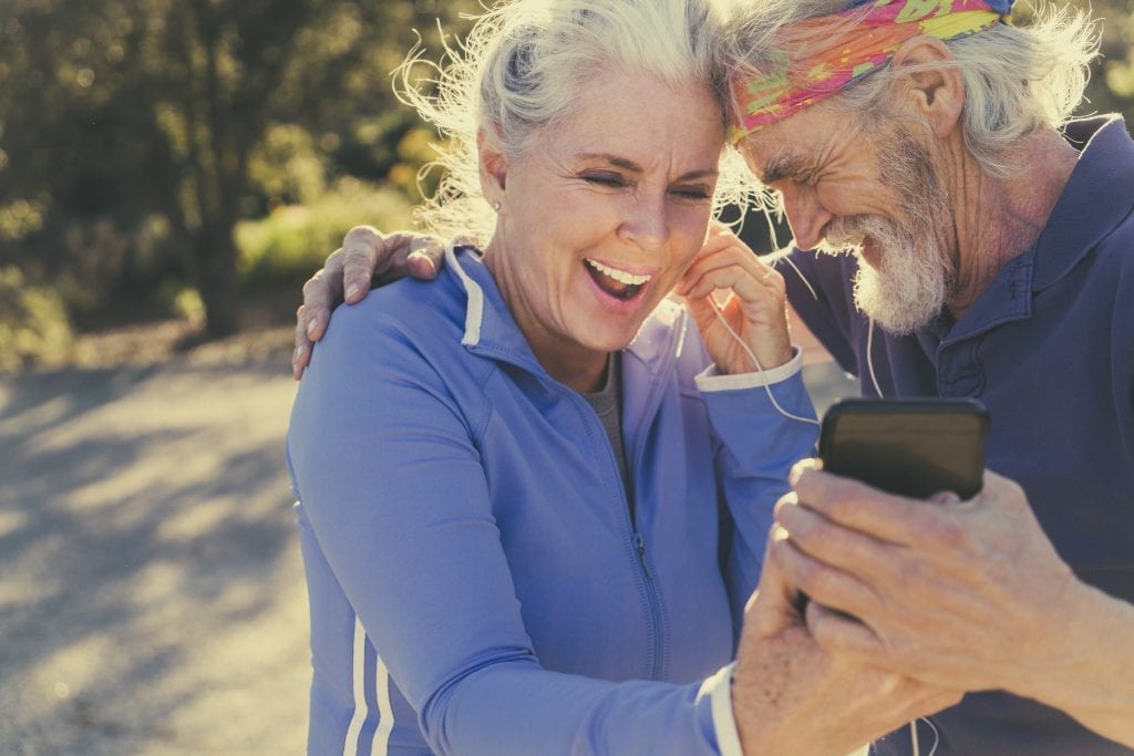 Senior couple listening to music