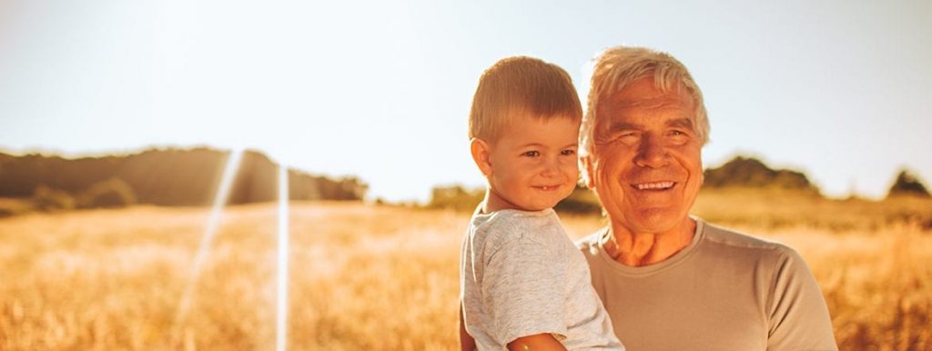 Grandfather playing with his grandchildren