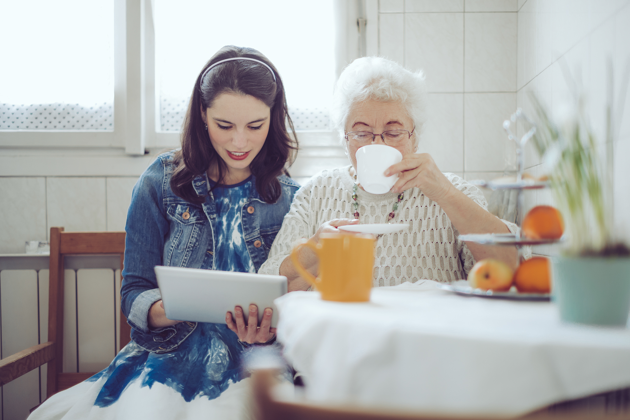 Social worker is visiting a senior woman