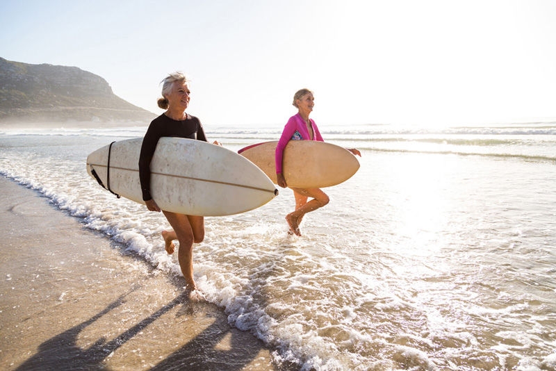 Women surfing