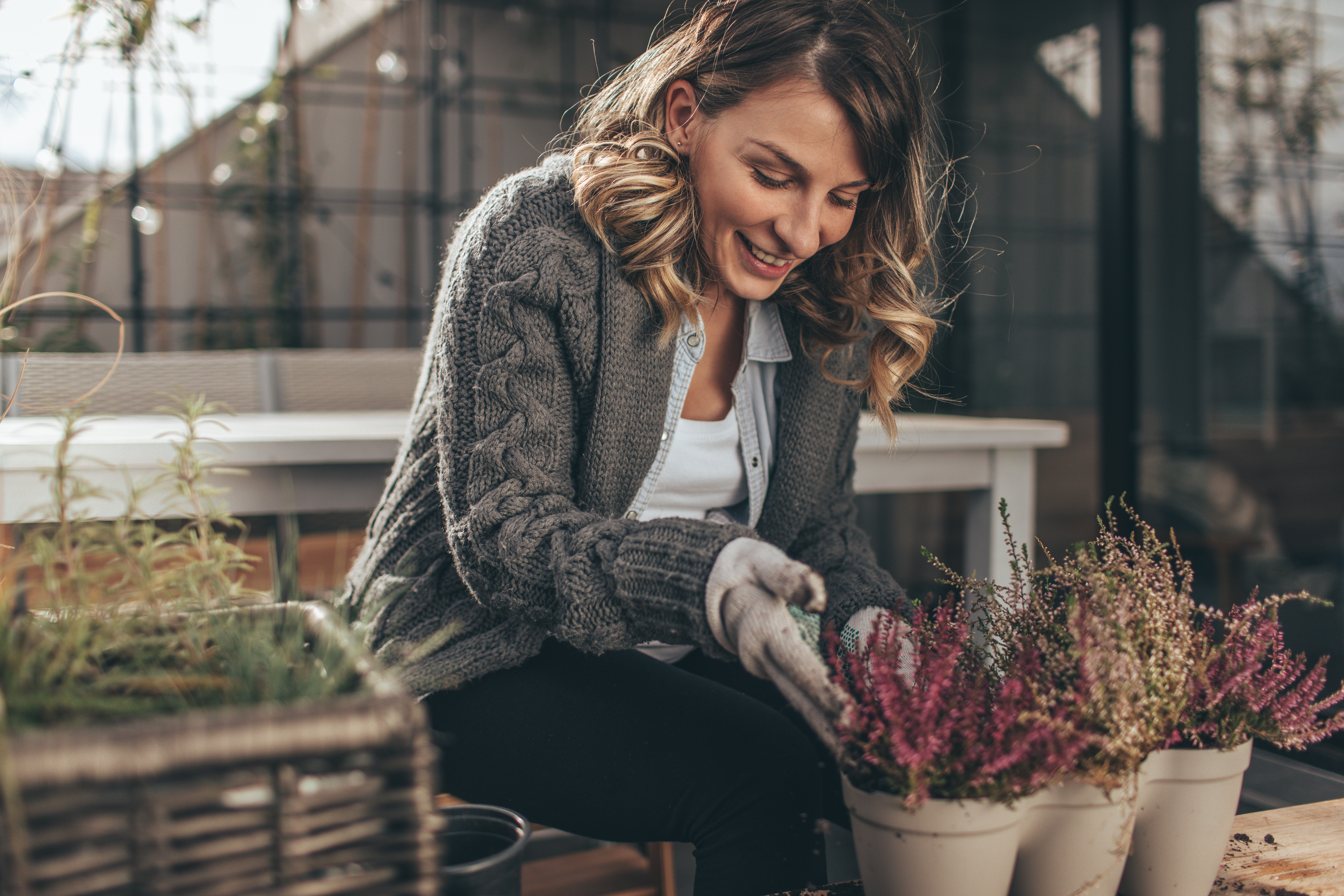 Woman taking care of plant